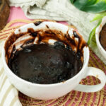 Top view of a moist, eggless chocolate mug cake