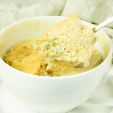 Detail shot of a moist spoonful of homemade banana mug cake