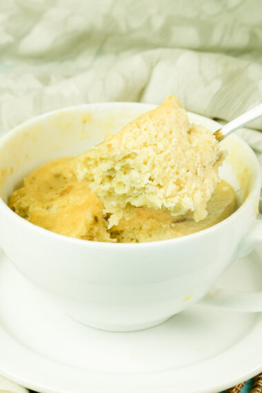 Detail shot of a moist spoonful of homemade banana mug cake