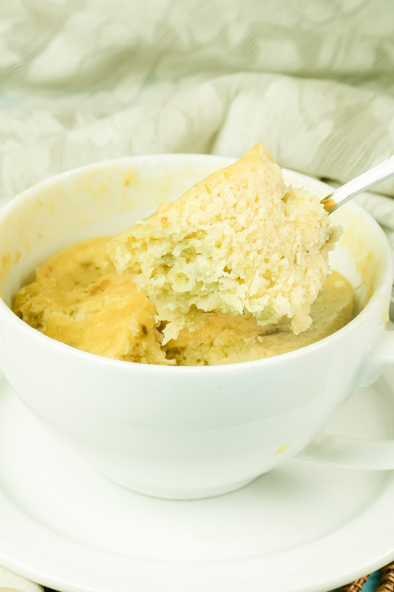 Detail shot of a moist spoonful of homemade banana mug cake