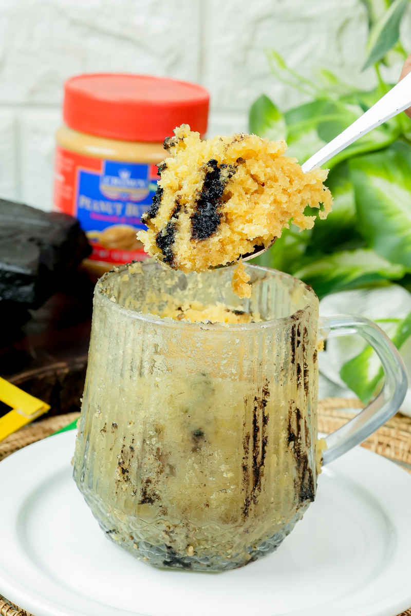 Close-up of peanut butter mug cake texture with chocolate swirls