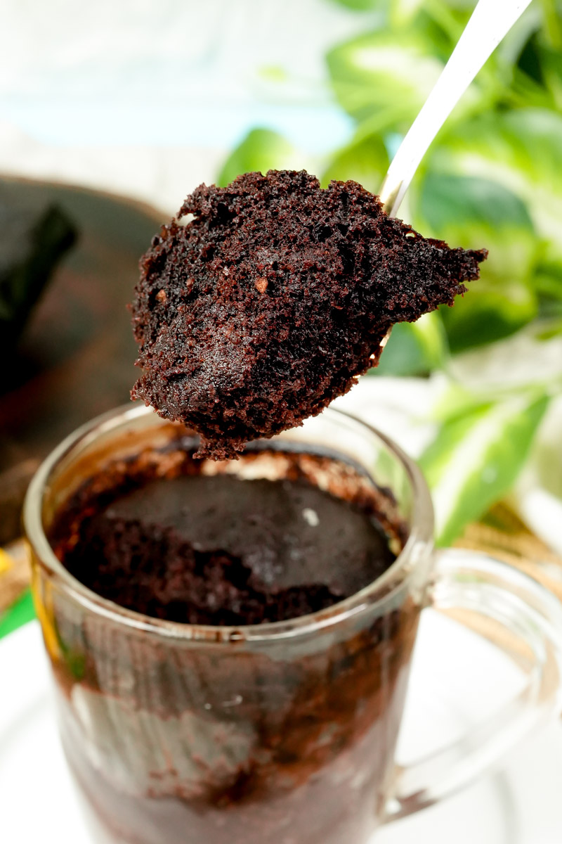 Close-up of a spoonful of moist gluten-free chocolate cake